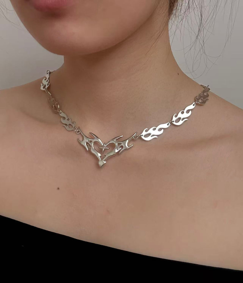 Chains | titanium-steel | Cybernicho | Sculptural Molten Ignis | organic-flame-structure