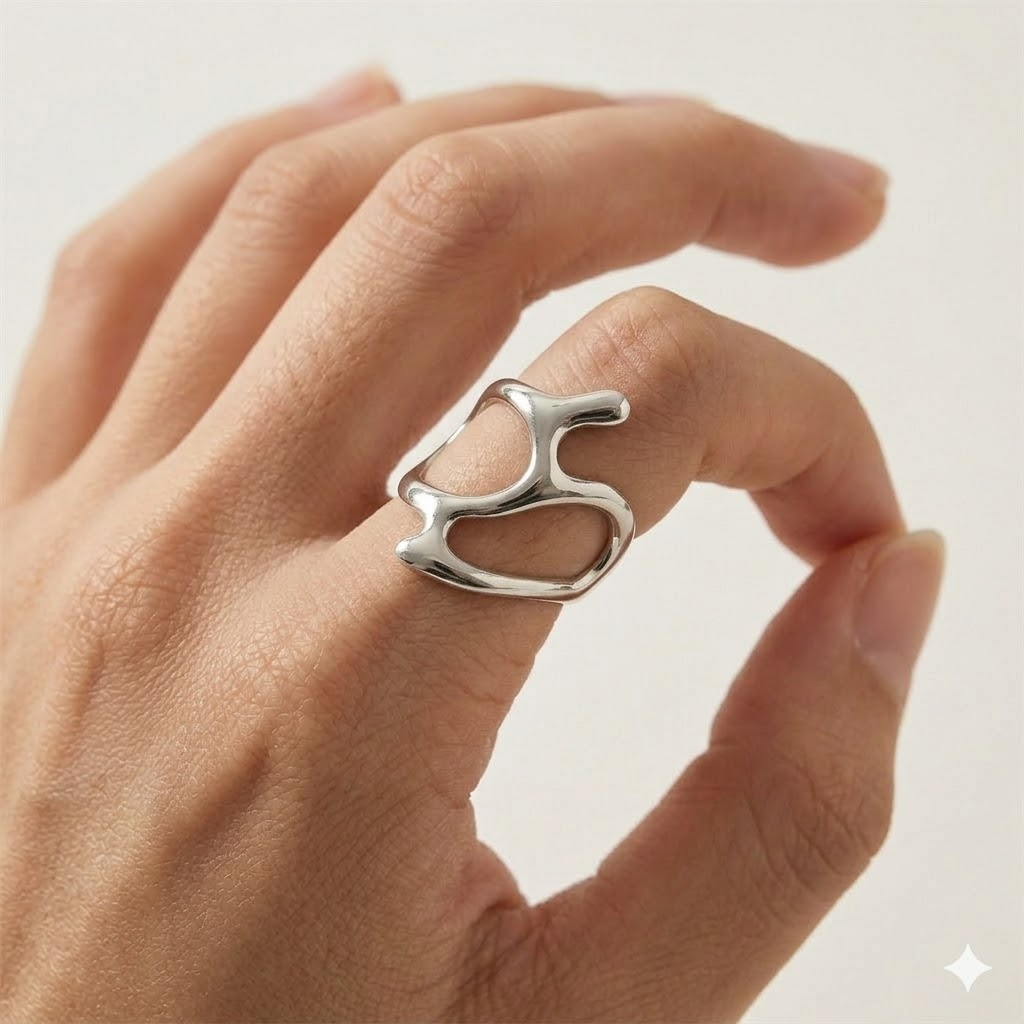 Rings | stainless-steel | Cybernicho | Sculptural armor ring styled on hand with industrial aesthetic
