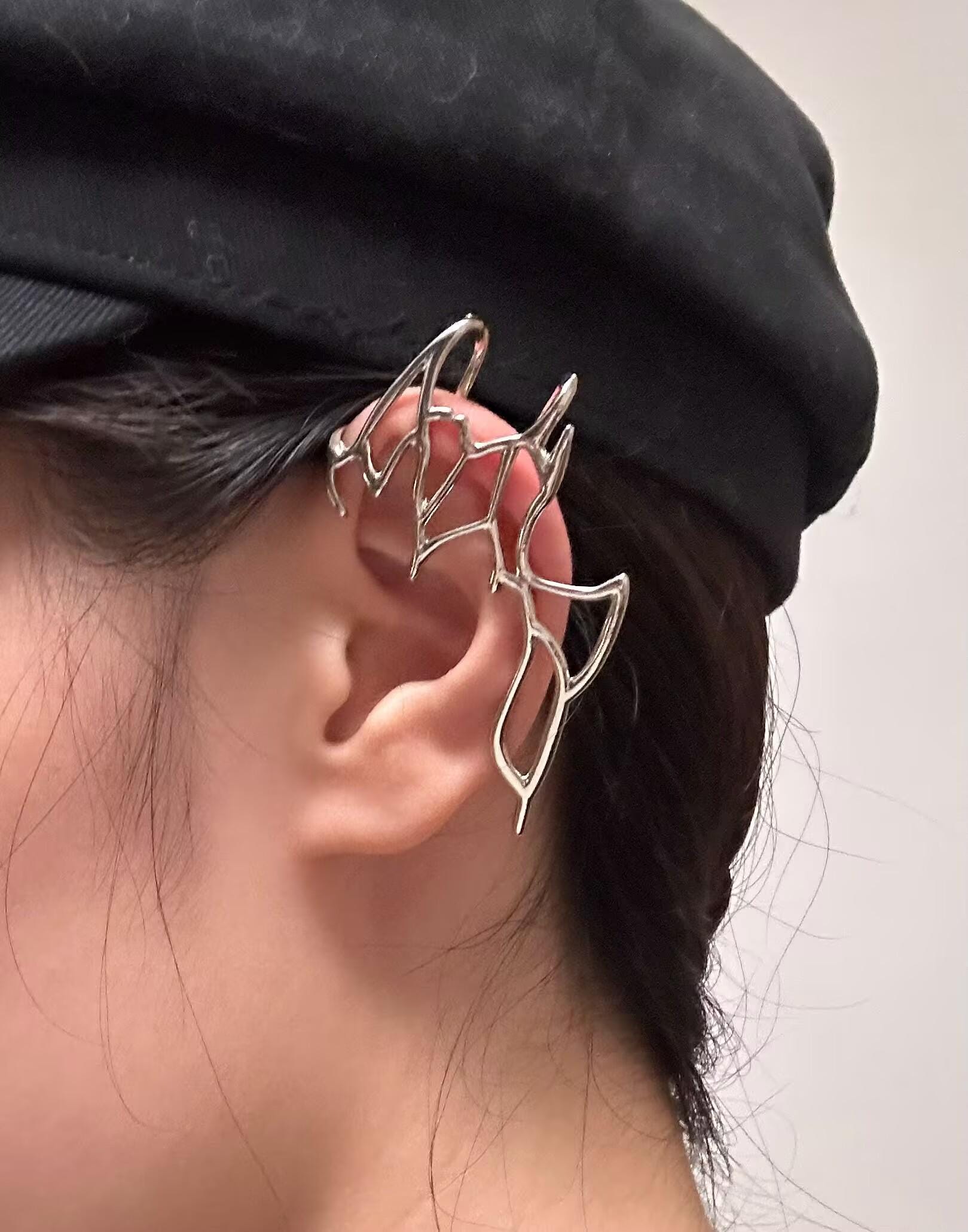 Ear Hook | silver | Cybernicho | Molten Wing Asymmetrical Ear Cuff | no-piercing-cyberpunk-industrial-jewelry