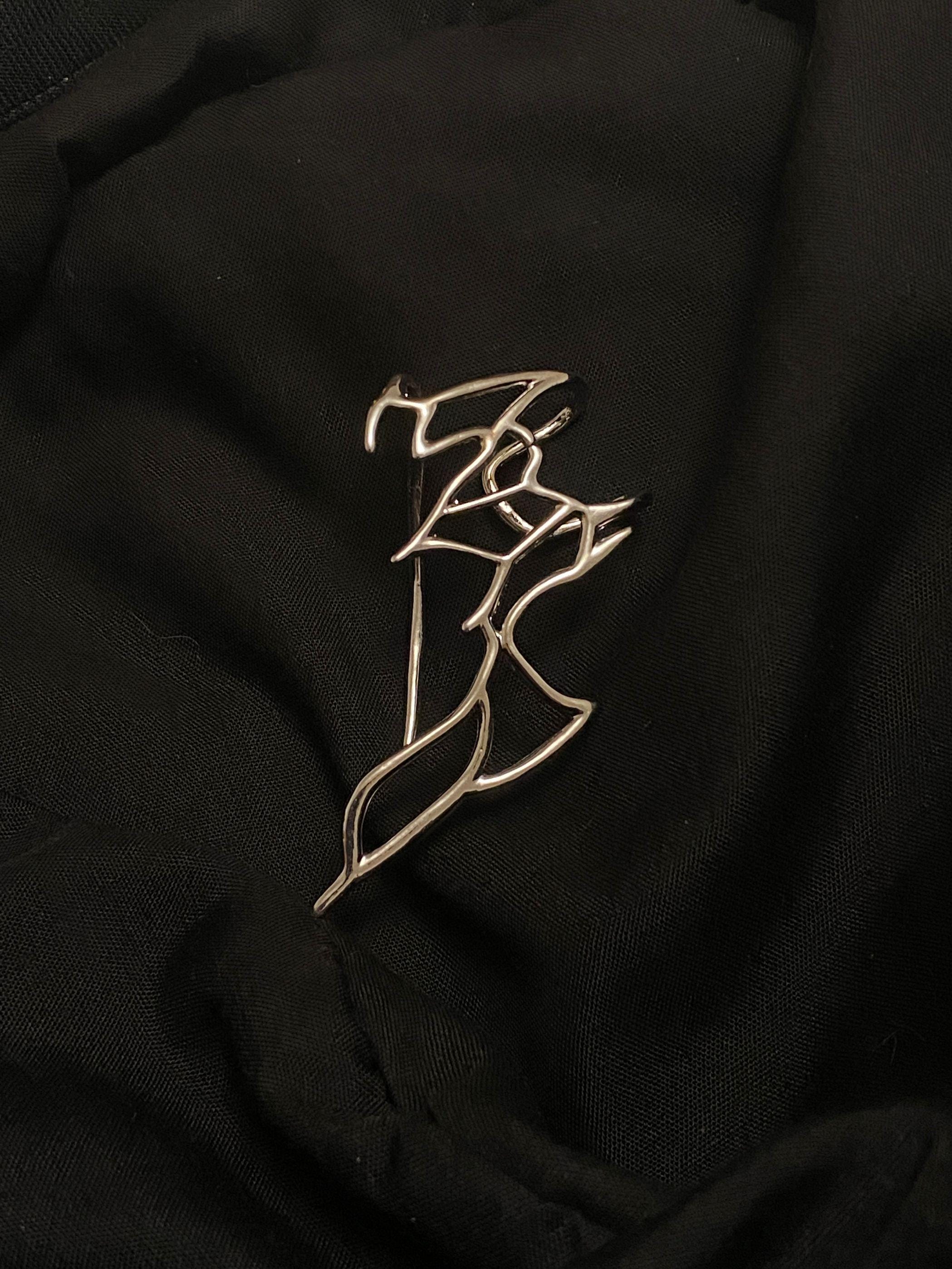 Ear Hook | silver | Cybernicho | Molten Wing Asymmetrical Ear Cuff | no-piercing-cyberpunk-industrial-jewelry