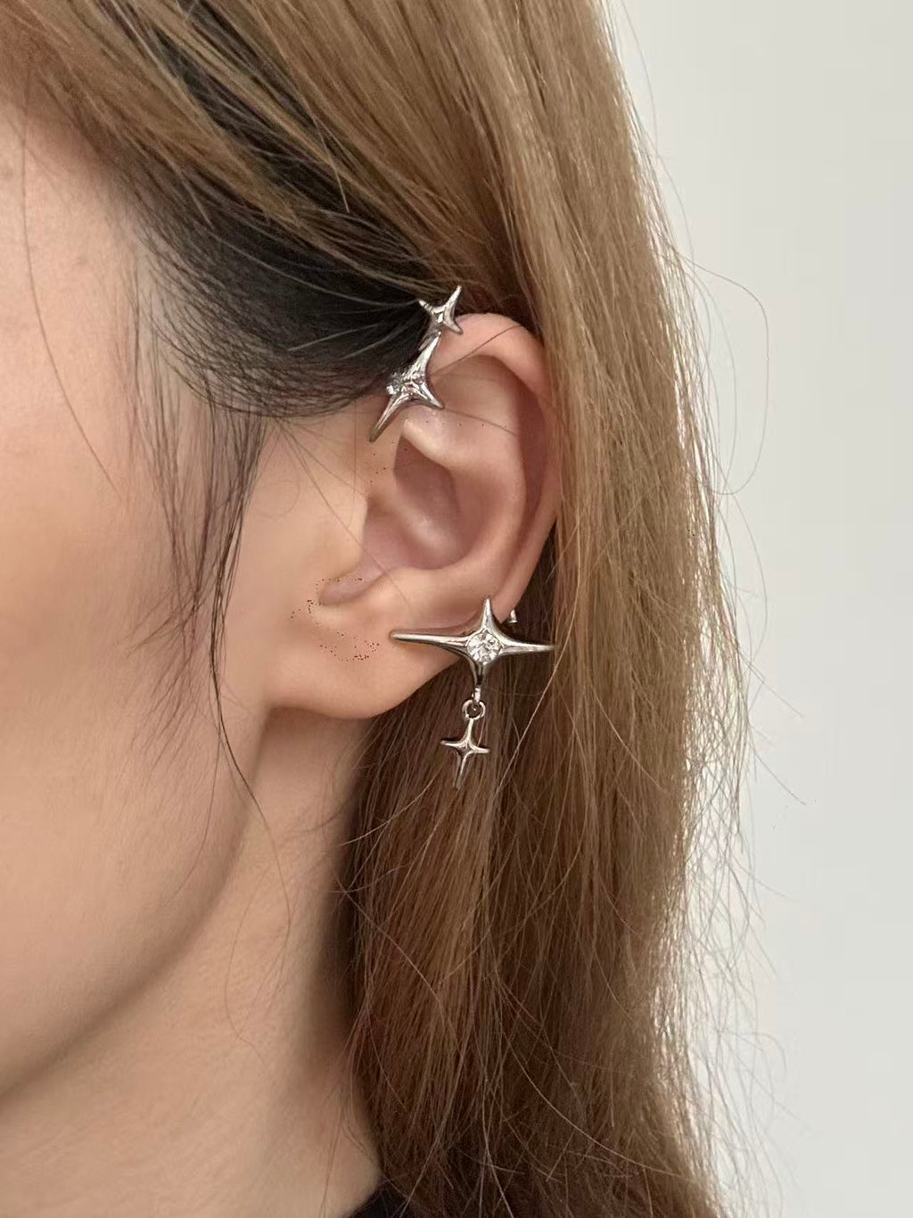 Earrings | polished-chrome | Cybernicho | Molten Starburst Liquid Ear Wrap | cyberpunk-celestial-aesthetic
