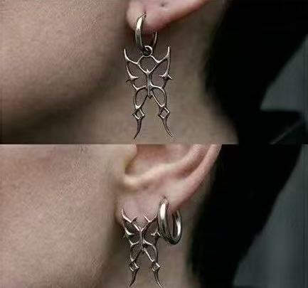 Earrings | polished-silver | Cybernicho | Molten Morpho Thorn Hoops | liquid-metal-butterfly-spike-design