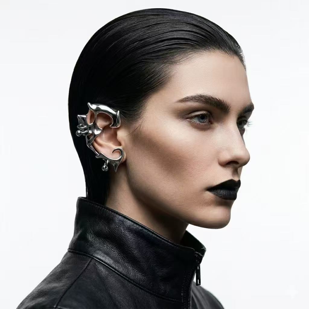 Earrings | polished-silver | Cybernicho | Molten Predator Mechanical Ear Wrap | 3D-liquid-metal-claw-design