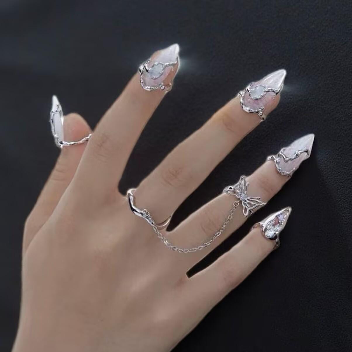 Nail Armor | silver | Cybernicho | Molten Flutter Butterfly Nail Ring | adjustable-moonstone-cyberpunk-jewelry