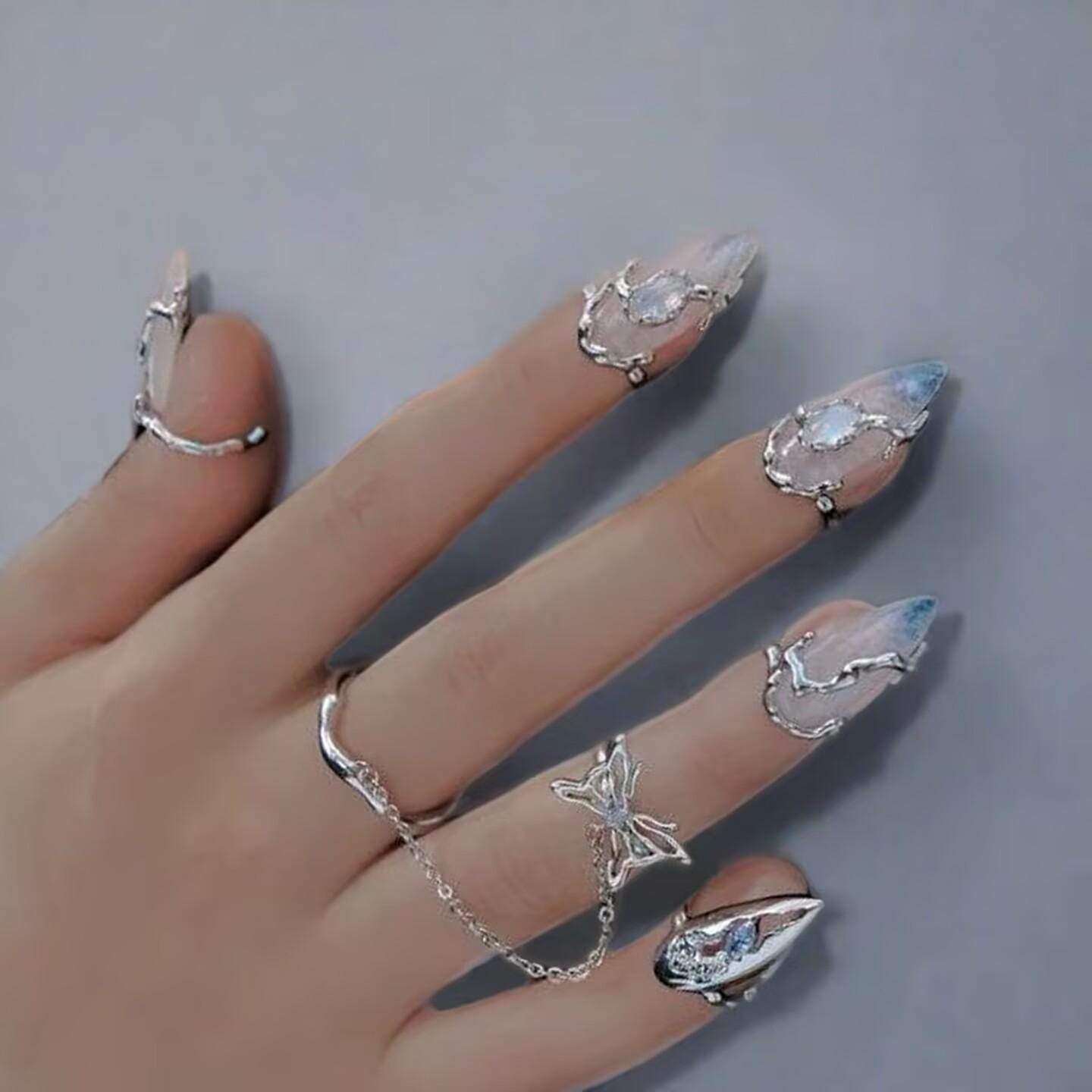 Nail Armor | silver | Cybernicho | Molten Flutter Butterfly Nail Ring | adjustable-moonstone-cyberpunk-jewelry